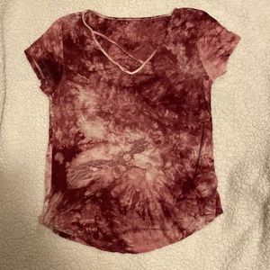 Maroon tie dye Tshirt. Two strings cross over chest area. Medium size.